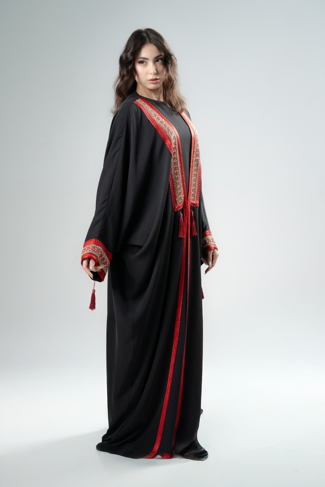 Black kimono with red tassels