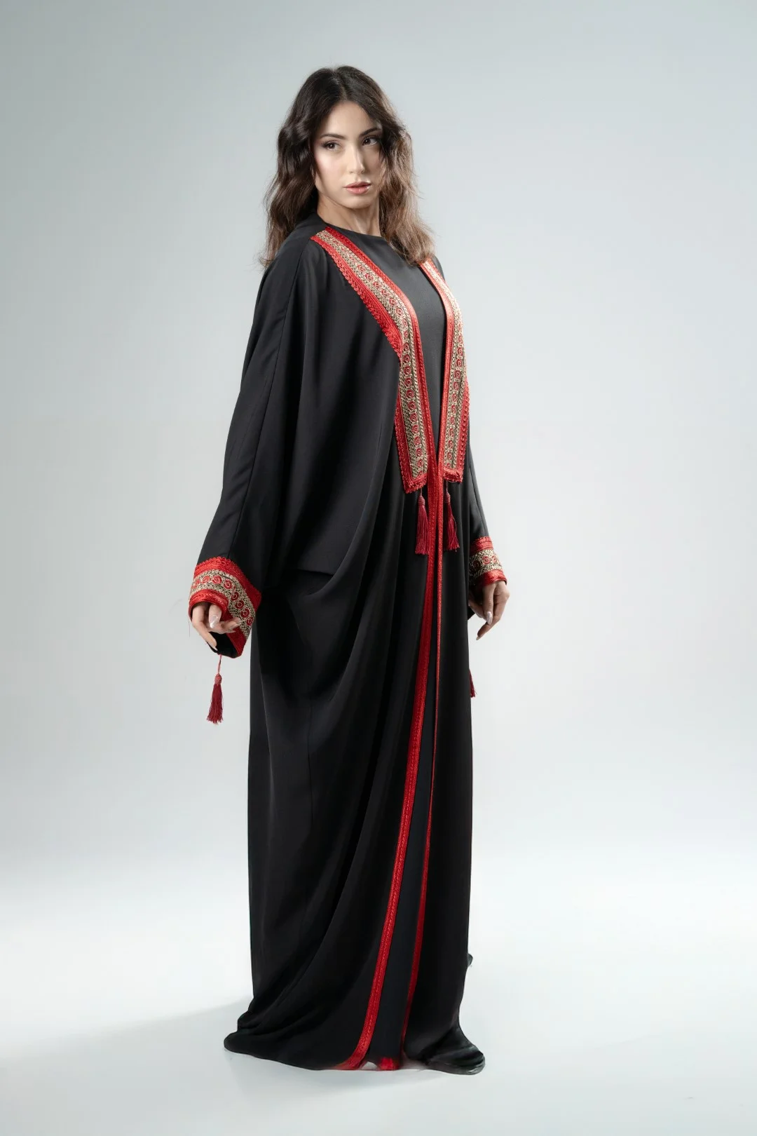 Black kimono with red tassels
