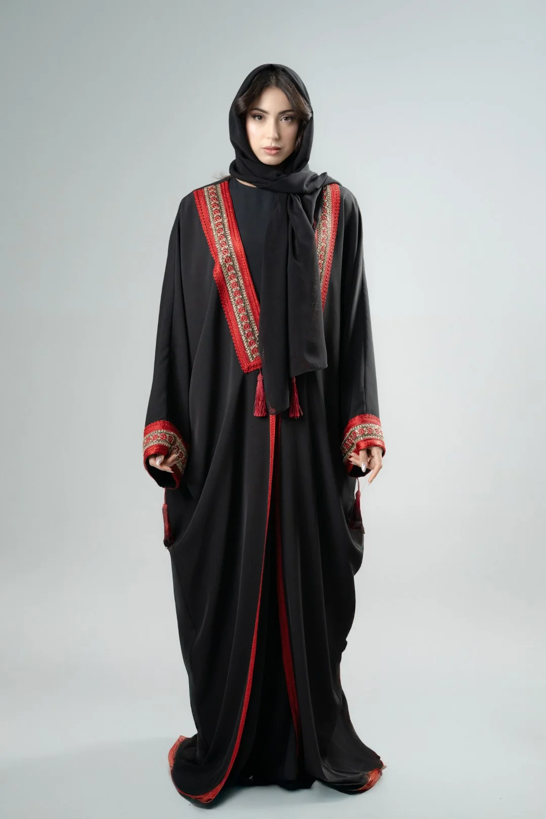 Black kimono with red tassels